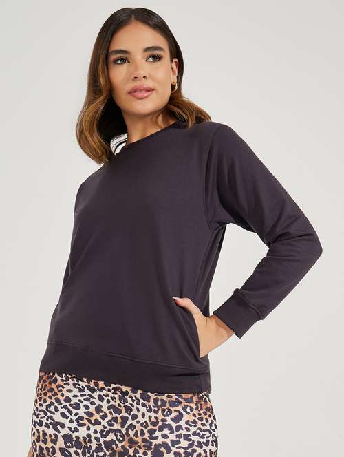 women black solid long sleeve sweatshirt - 21503950 -  Standard Image - 0