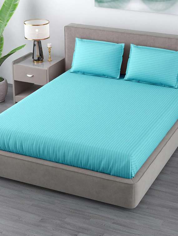 stripe printed bedsheet with pillow covers