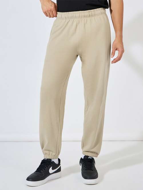 men solid relaxed fit jogger - 21544794 -  Standard Image - 0