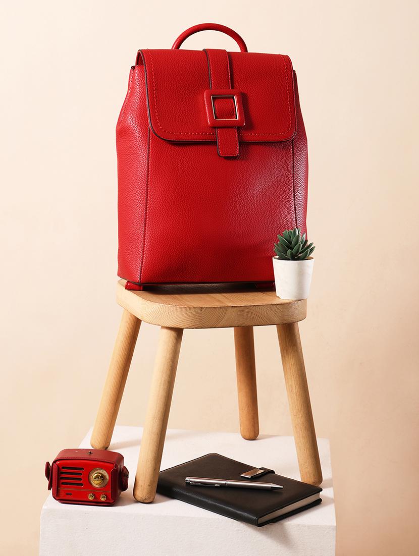 red textured leatherette backpack
