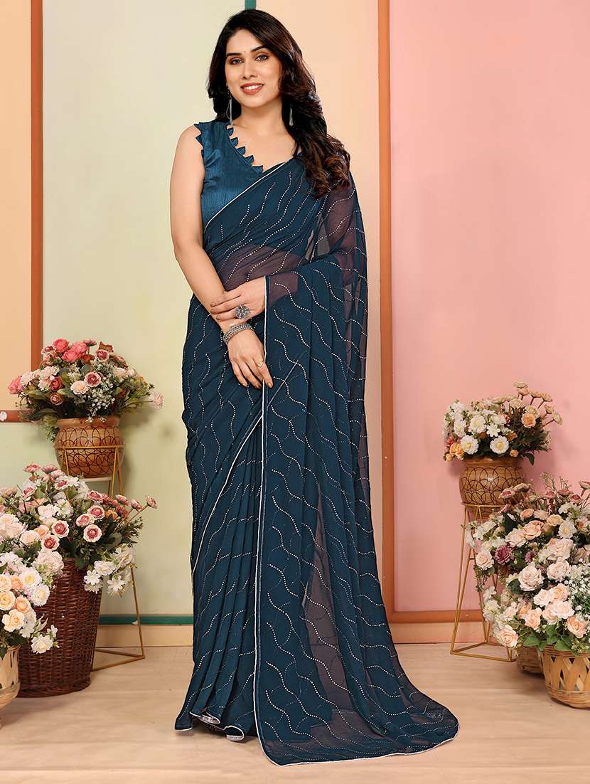 women solid with work embellished saree with blouse
