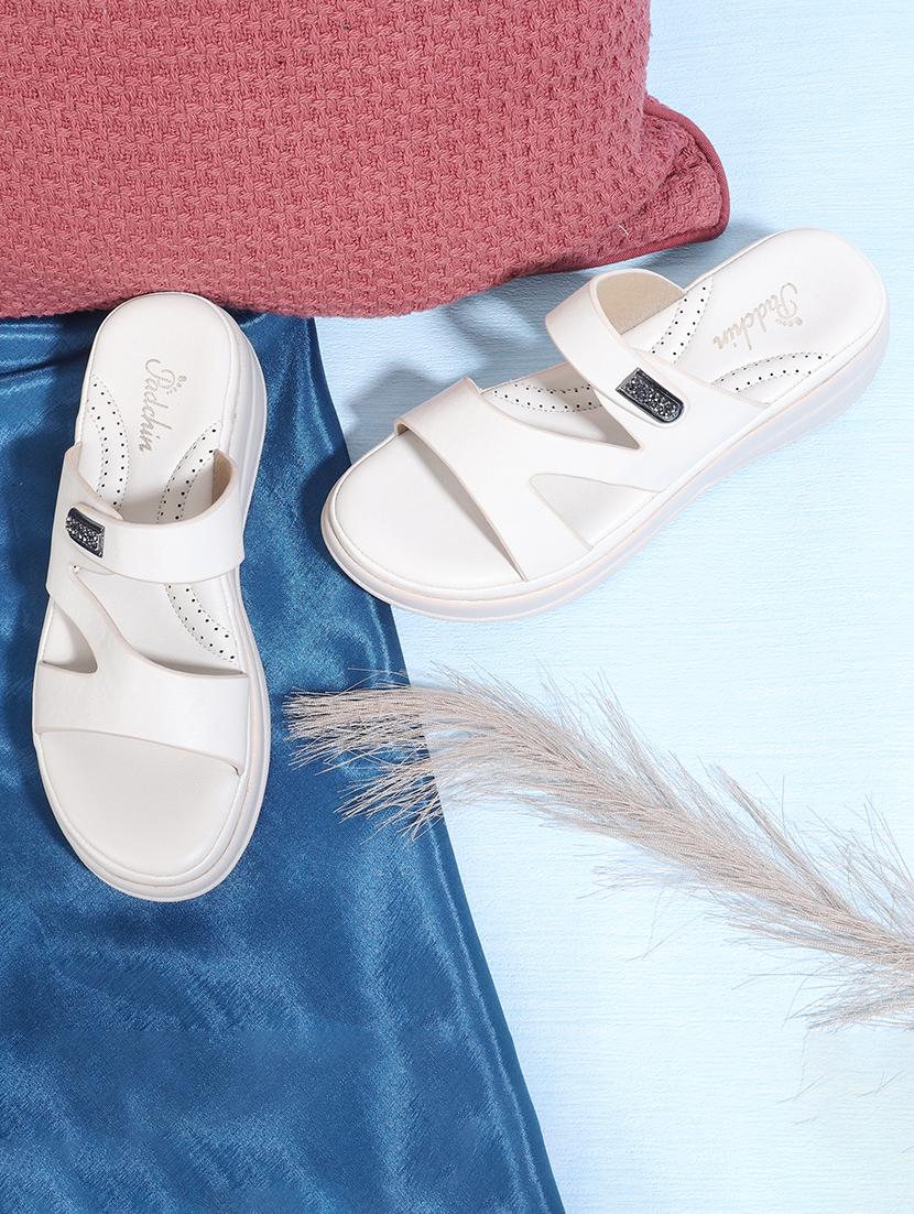 women cream solid slip on wedge