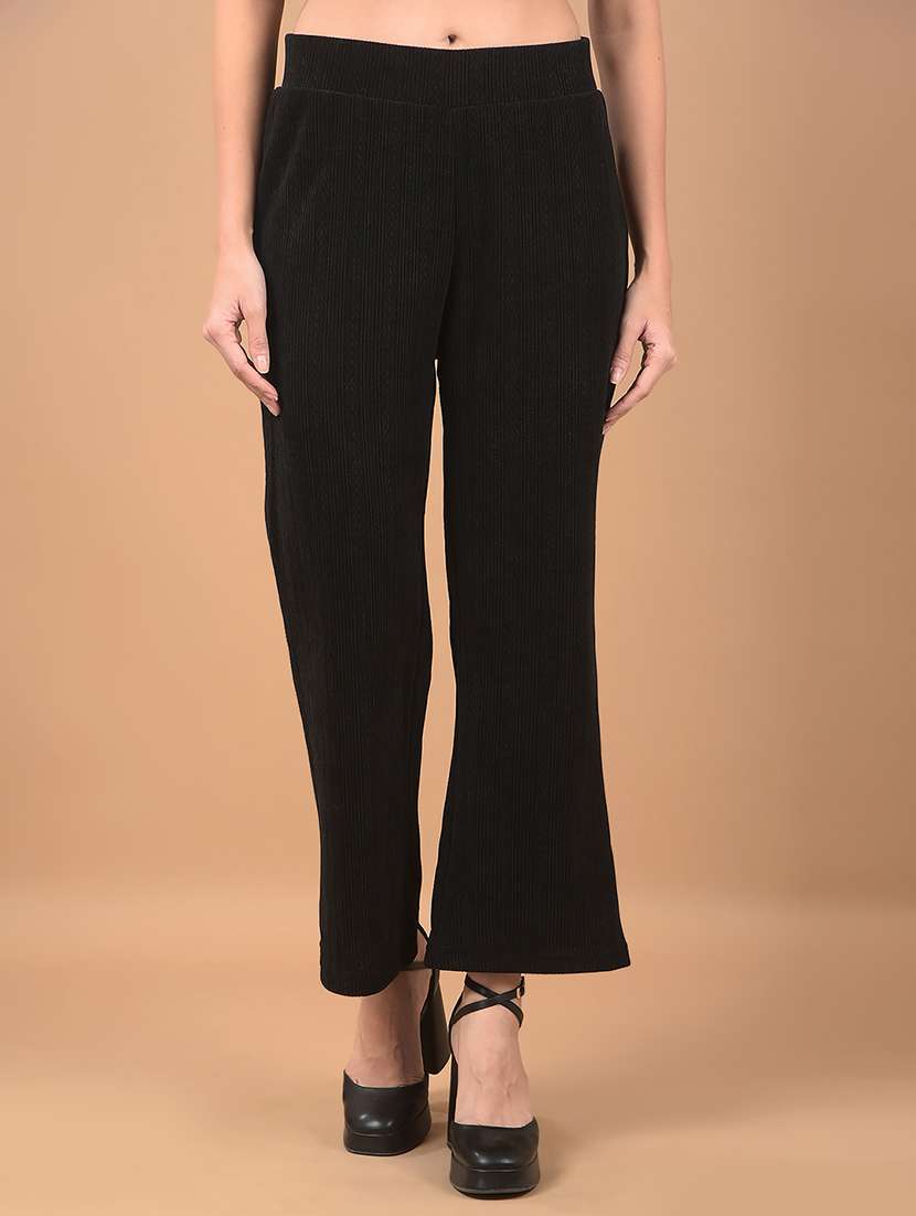 women black self design bootcut trousers