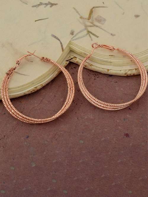 women gold brass hoop earrings - 21665584 -  Standard Image - 0