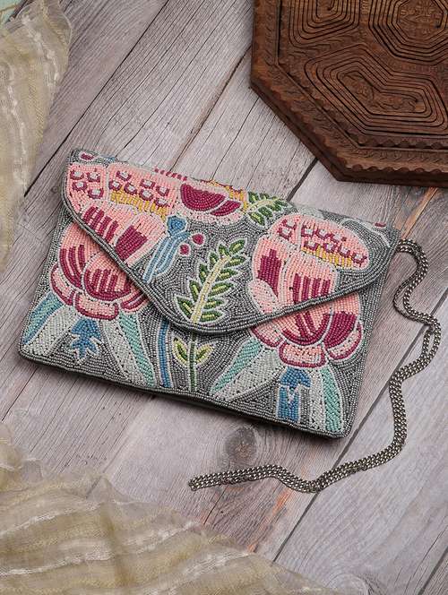 women embellished sling bag