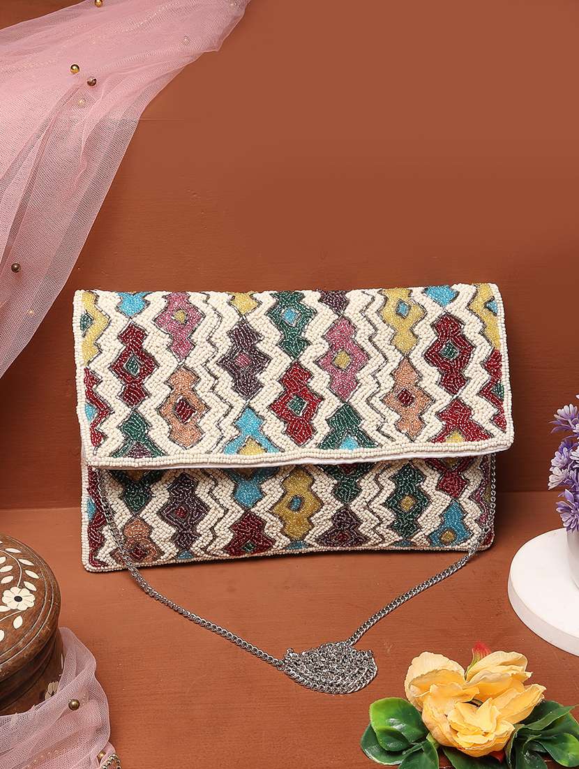 women embellished sling bag
