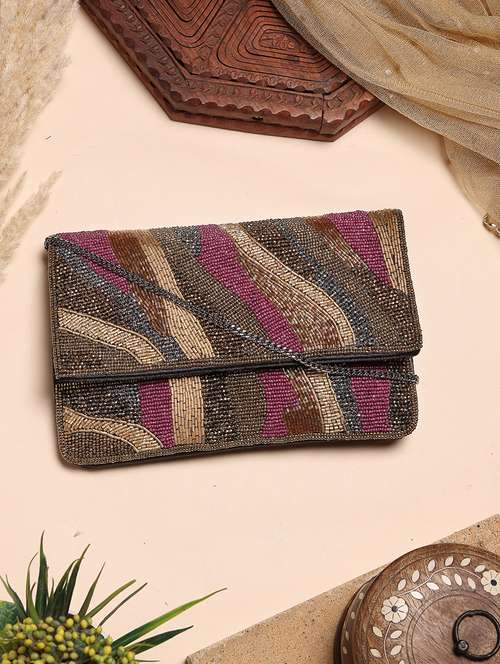 women embellished sling bag