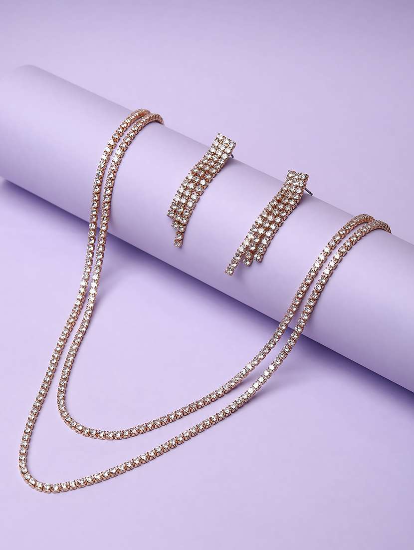women stone studded gold plated layered chain necklace with earrings