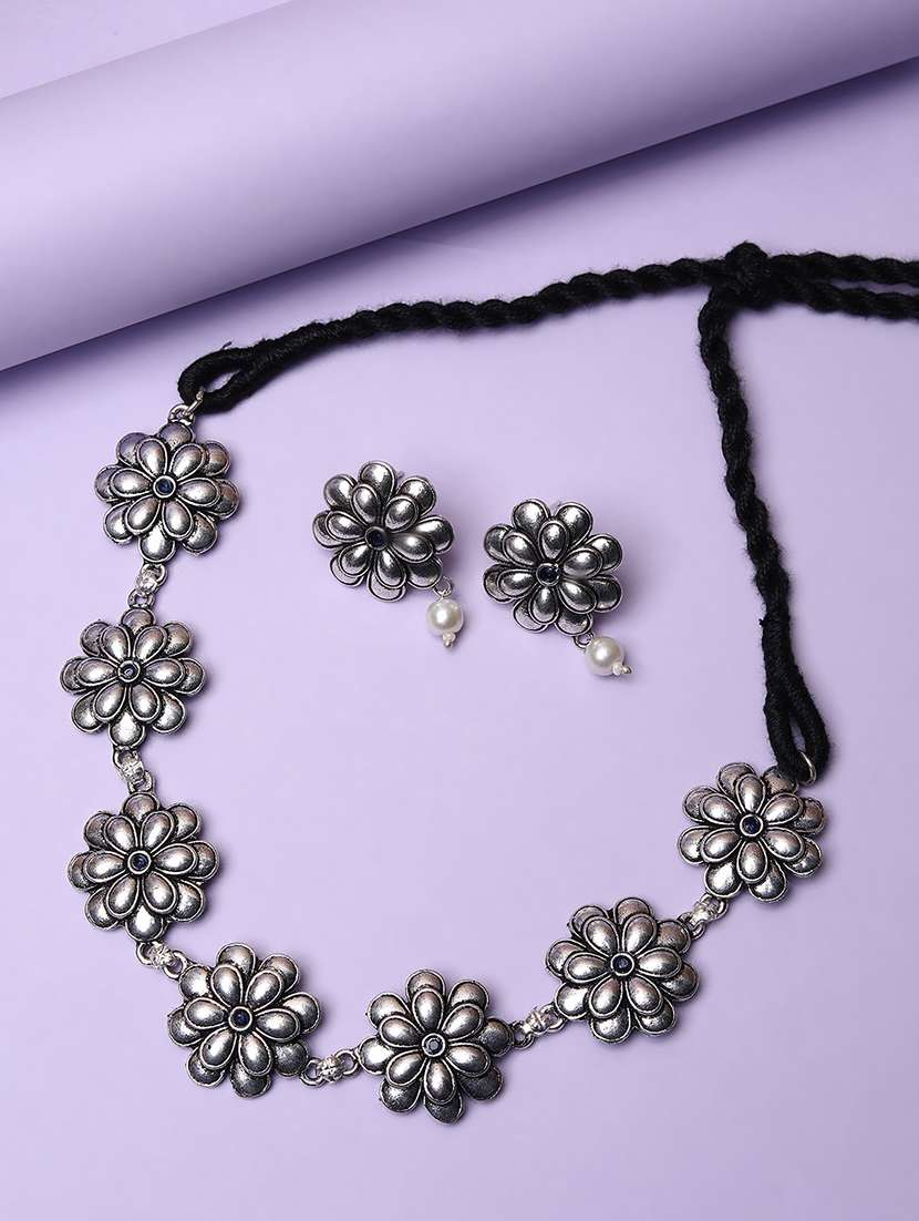 women silver oxidised necklace with earrings