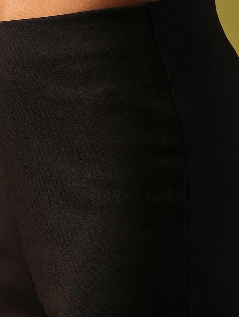 globus women black solid stretchable mid-rise high-low bottom hem flared party treggings - 21671754 - Standard Image - 5