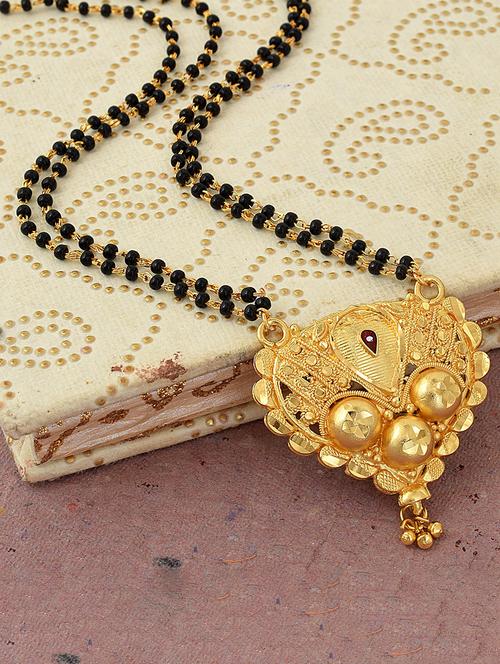 elegant black beaded mangalsutra with gold pendant - 21674496 - Standard Image - 0