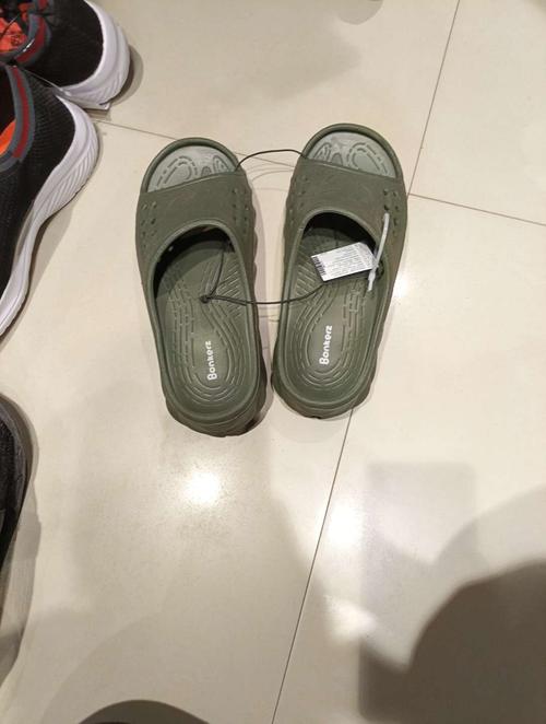 green pvc slippers - 21677935 -  Standard Image - 0