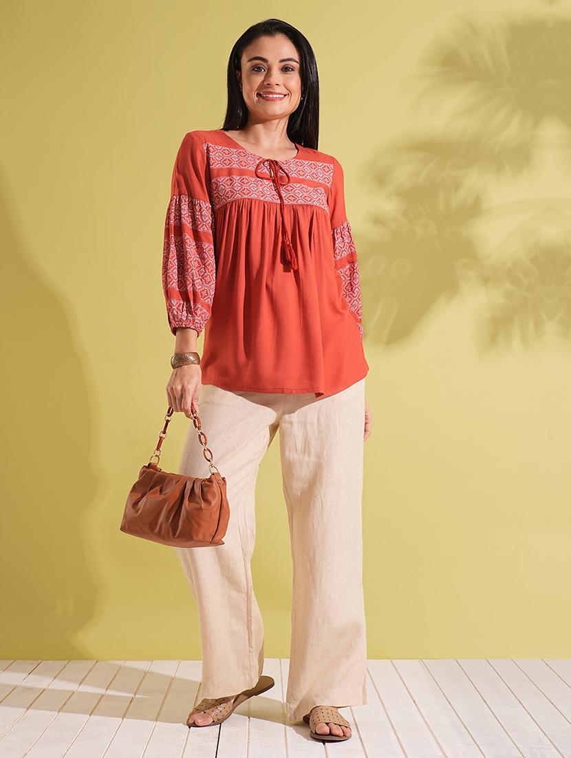 globus women rust tie-up round neck bishop sleeves ethnic print gathered a-line workwear tunic - 21704493 - Standard Image - 3