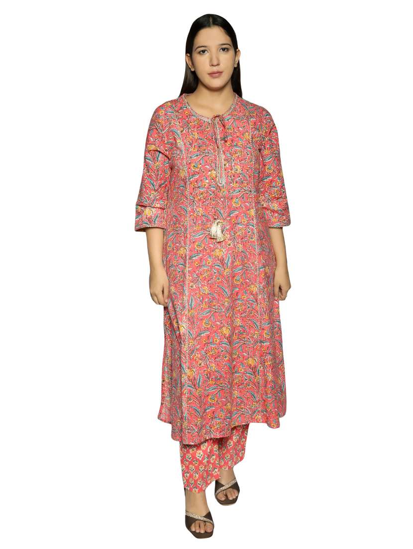 women peach floral printed tie-up neck kurta pant set
