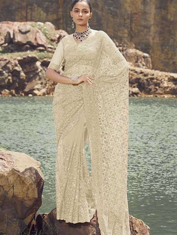 women solid with work embroidered saree with blouse - 21708483 - Zoom Image - 0