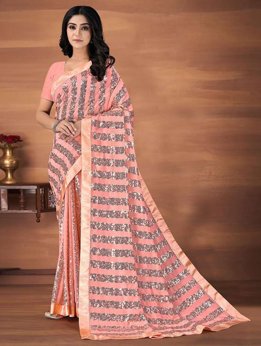 women peach printed saree with blouse