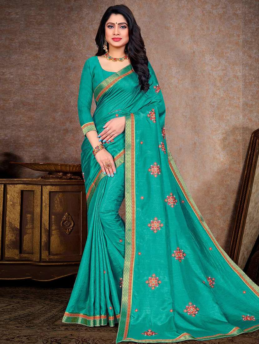 women turquoise embroidered saree with blouse