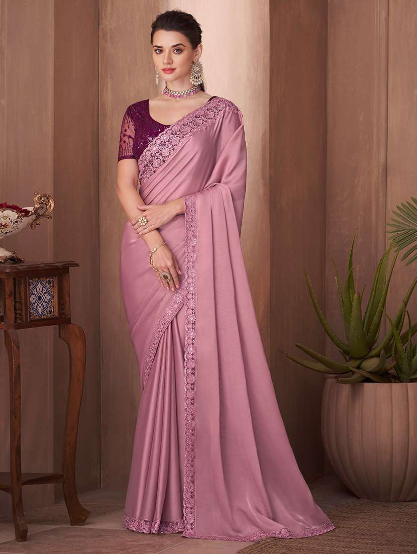 women pink lace bordered saree with blouse