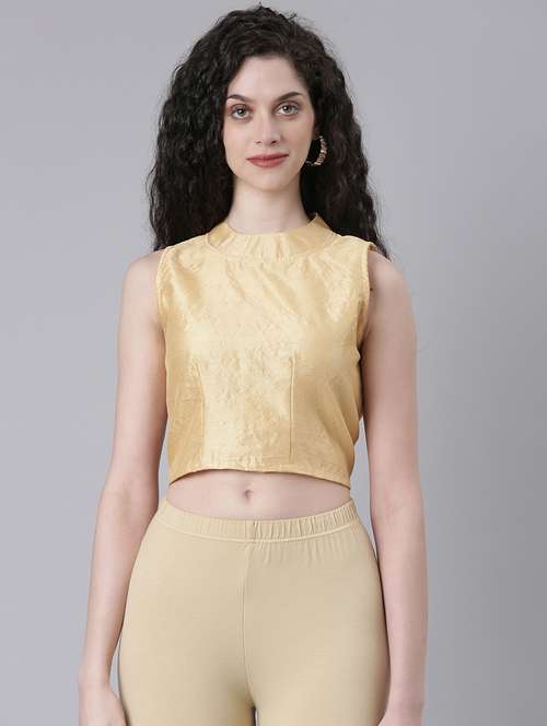 women beige solid stitched blouse