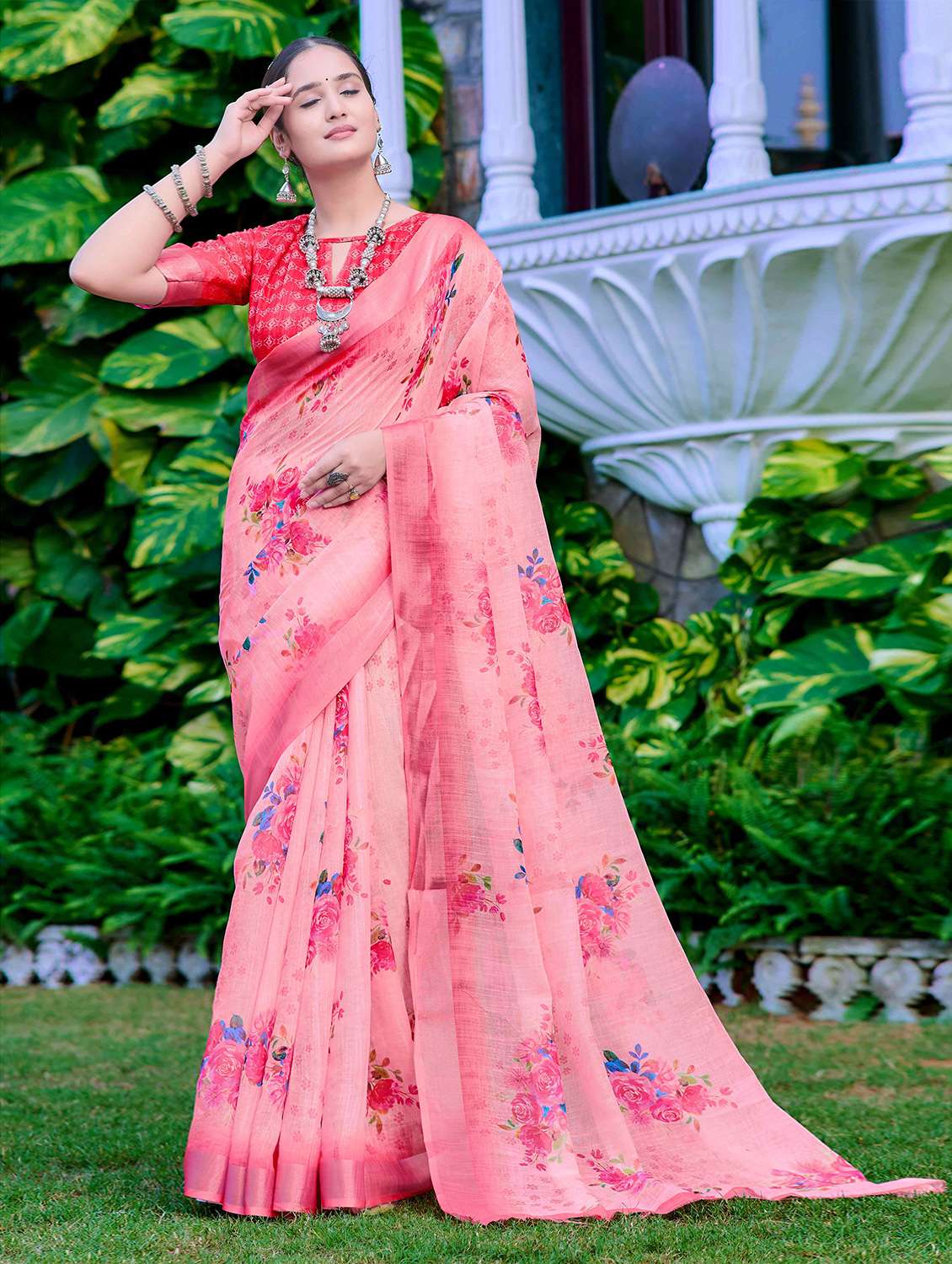 women peach floral printed saree with blouse