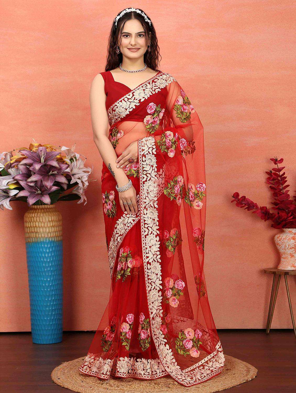 women red embroidered saree with blouse