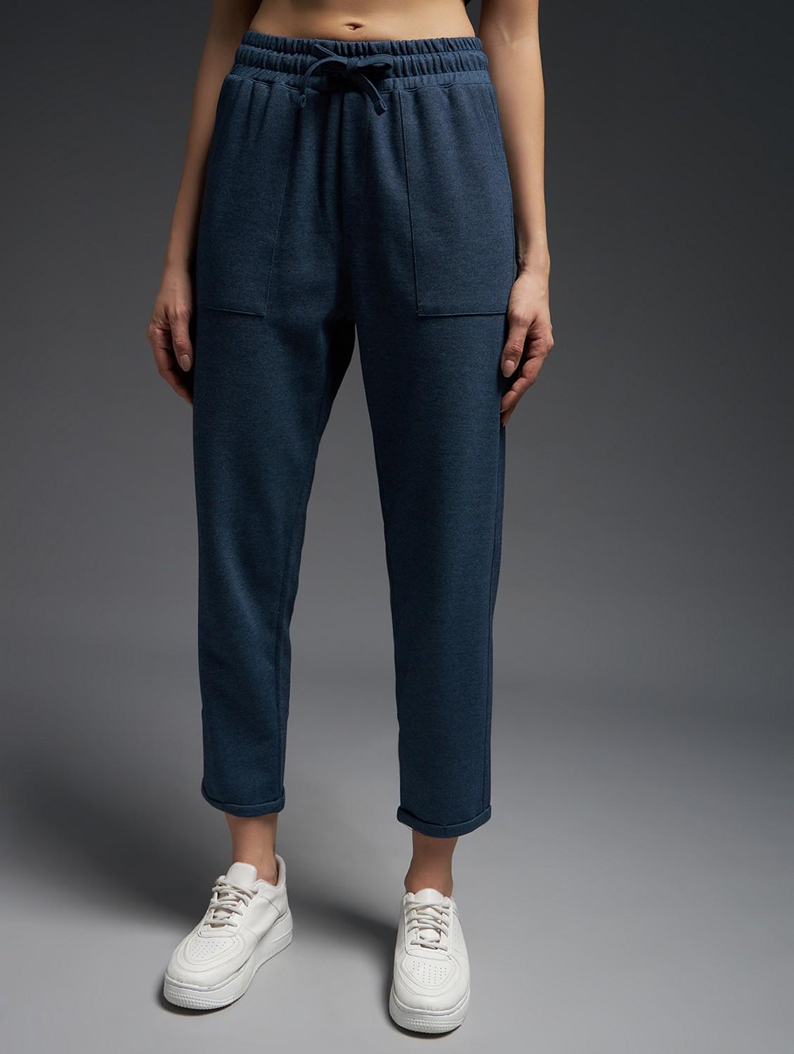 women solid mid rise track pant