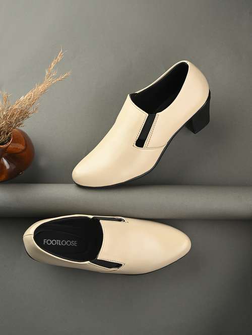 women beige slip on formal shoe
