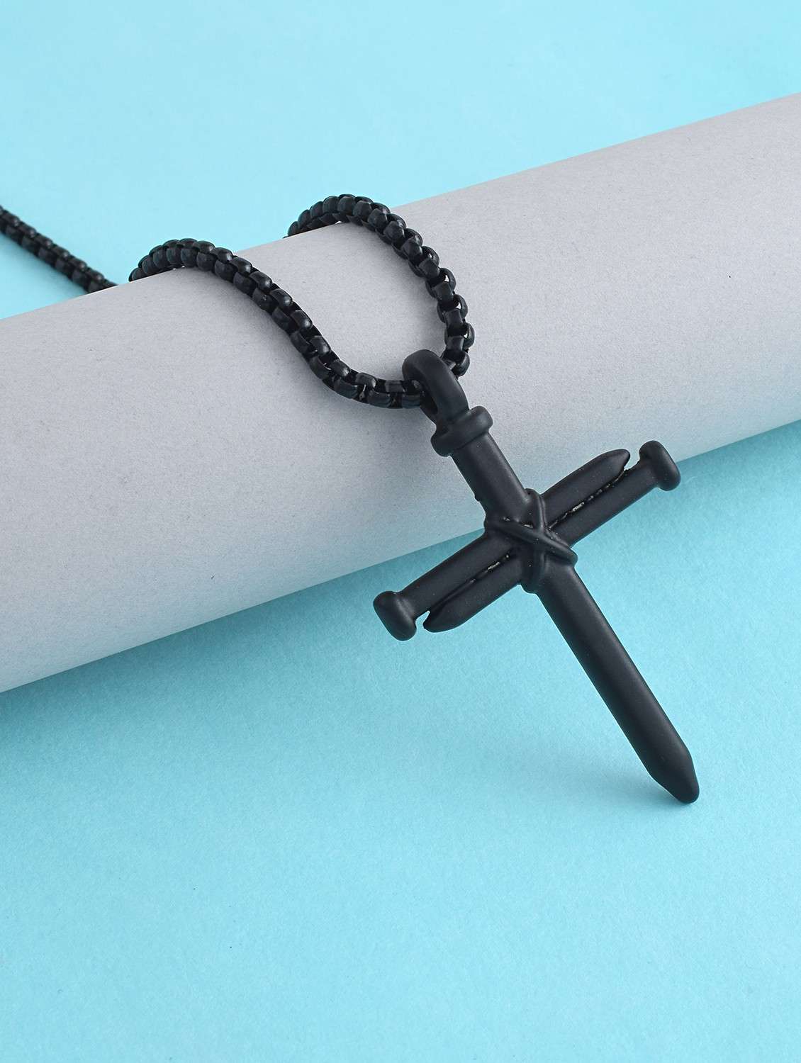 men black cross brass pendant