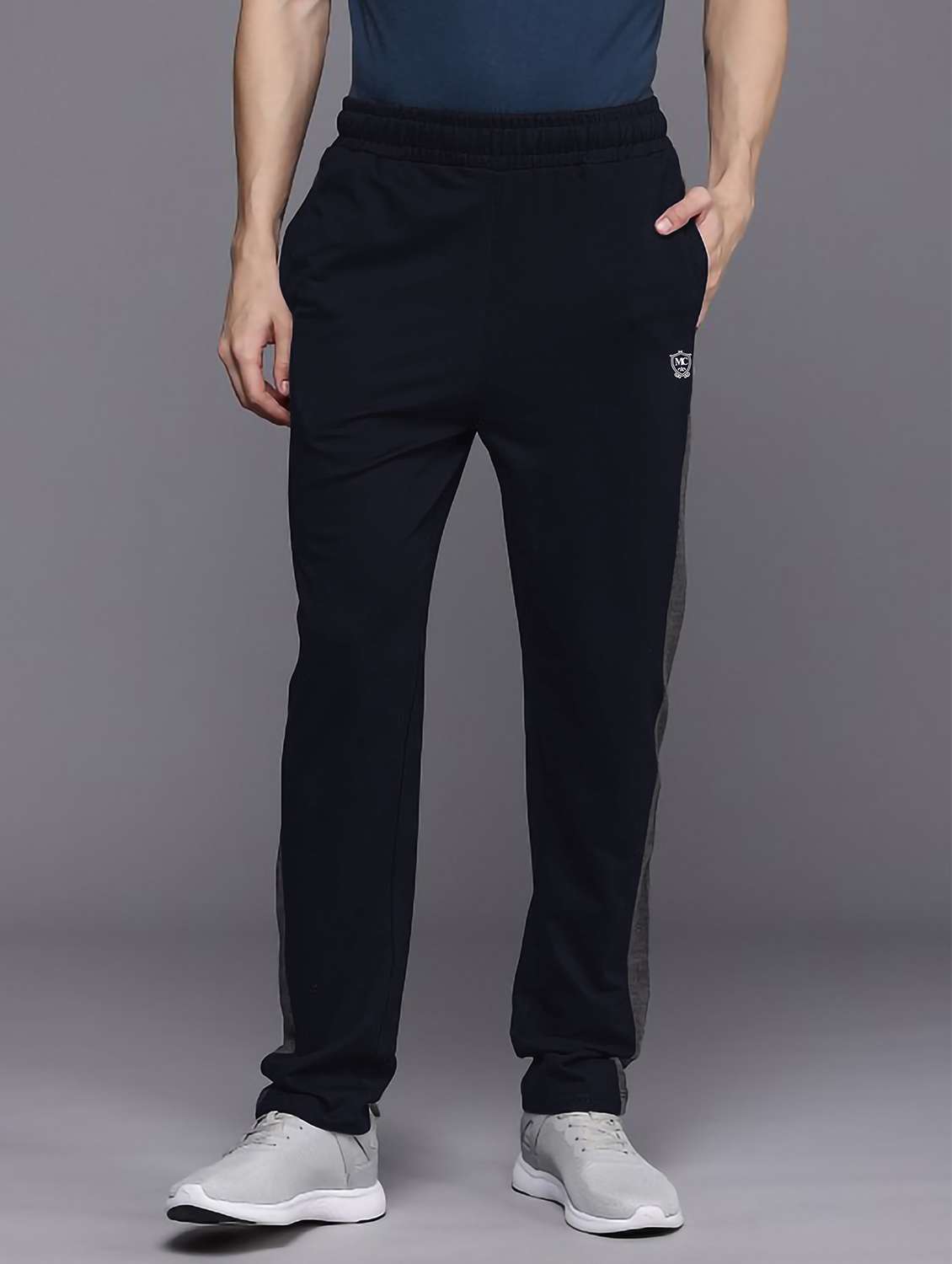 men side taped mid rise full length track pant