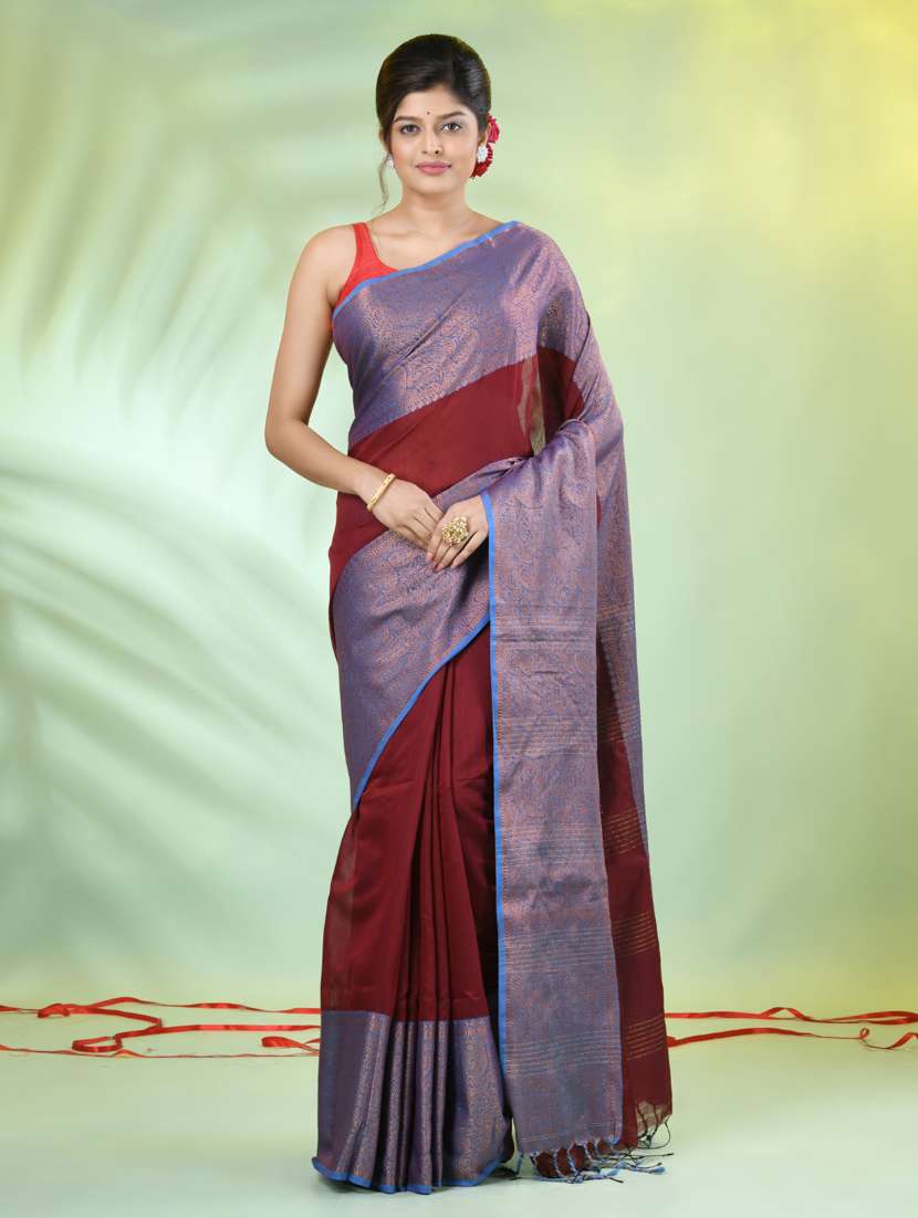 women solid with zari bordered saree with blouse
