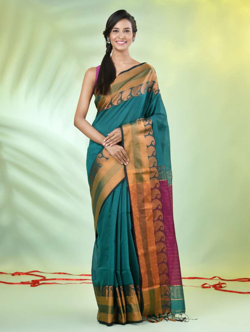 women solid with zari bordered saree with blouse