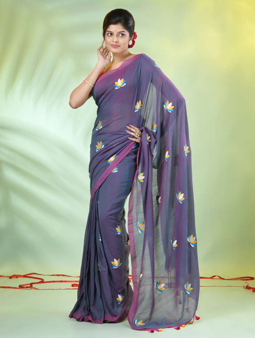 women blue embroidered saree with blouse