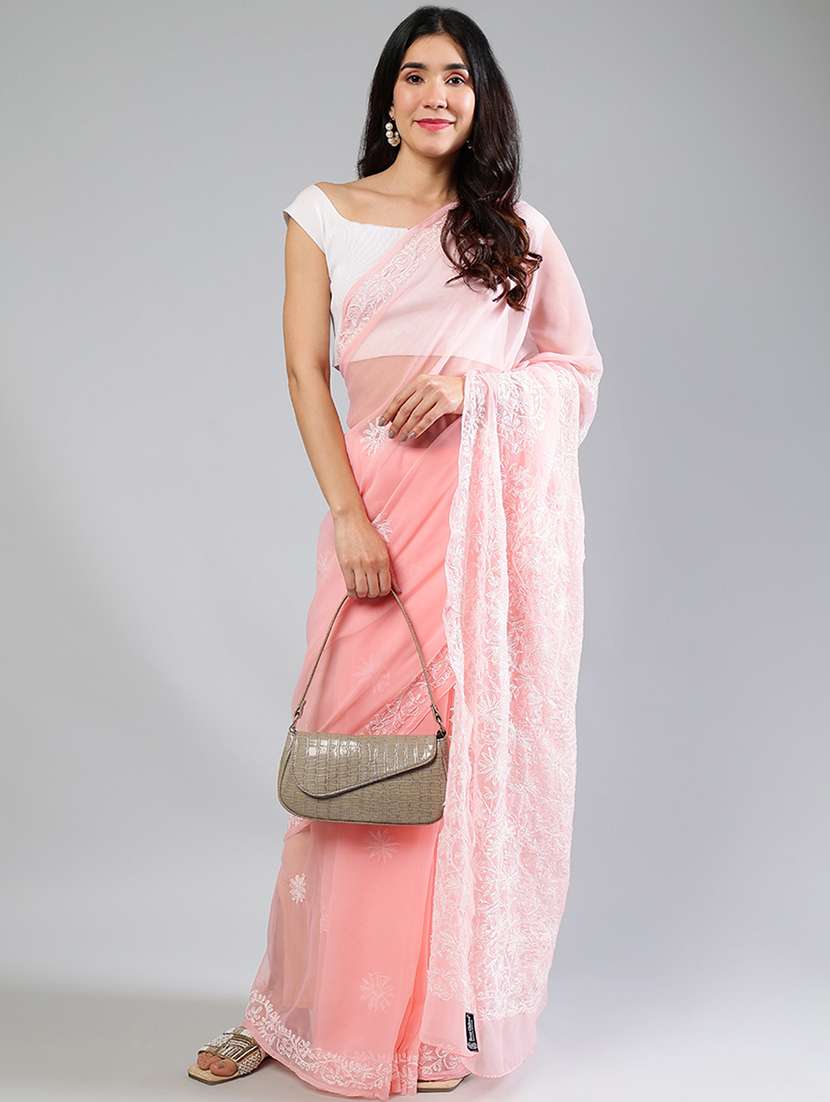 women peach chikankari work saree with blouse