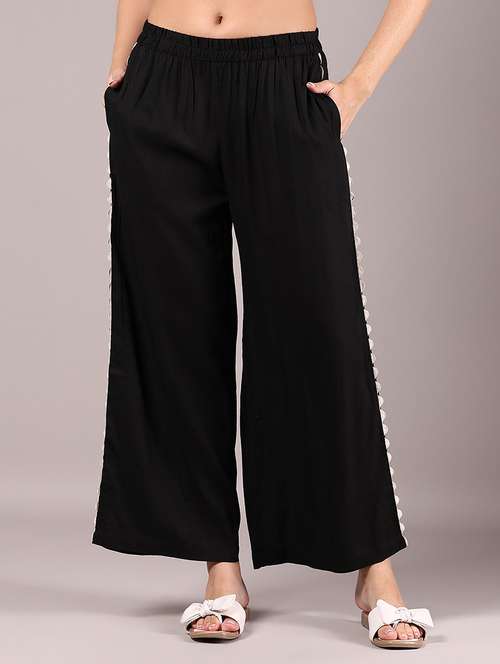 women solid mid rise flared palazzo