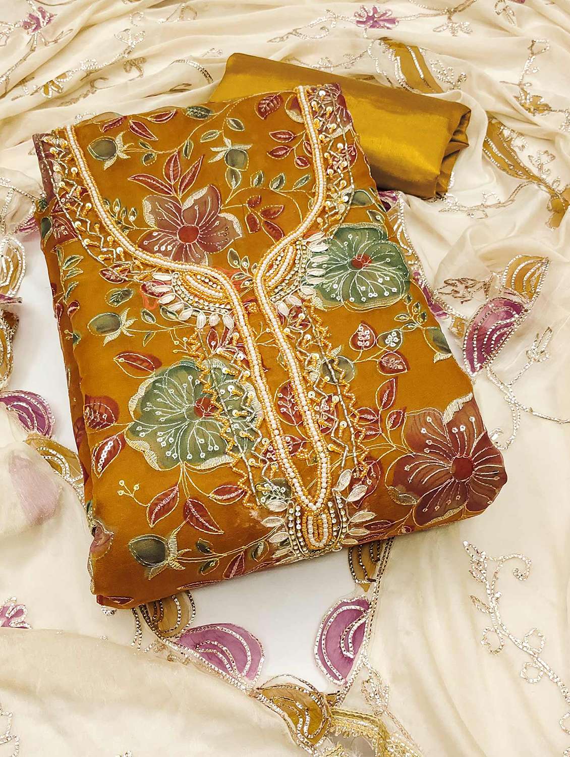 women embroidered unstitched suit set