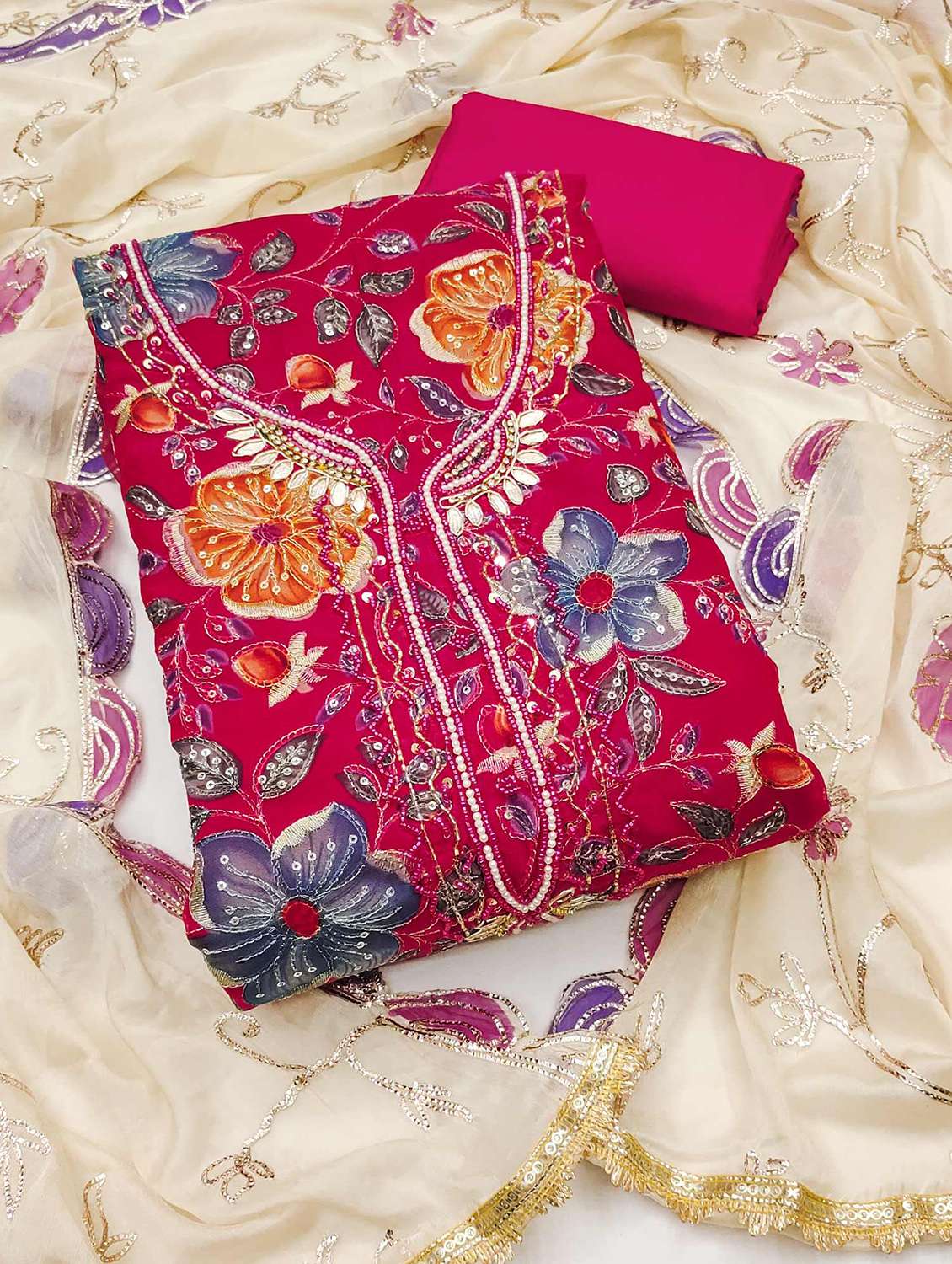 women embroidered unstitched suit set