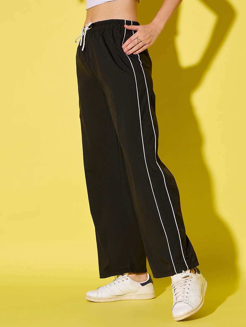 women solid high rise prachute pant 
