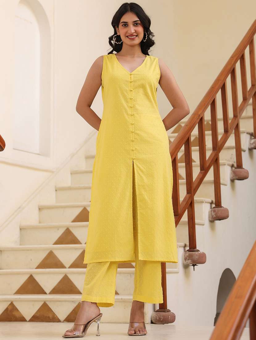 women yellow self design kurta pant set
