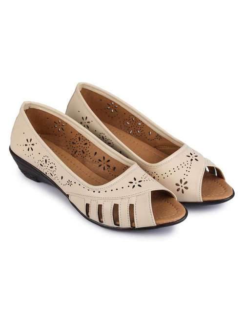 women cream slip on ballerina