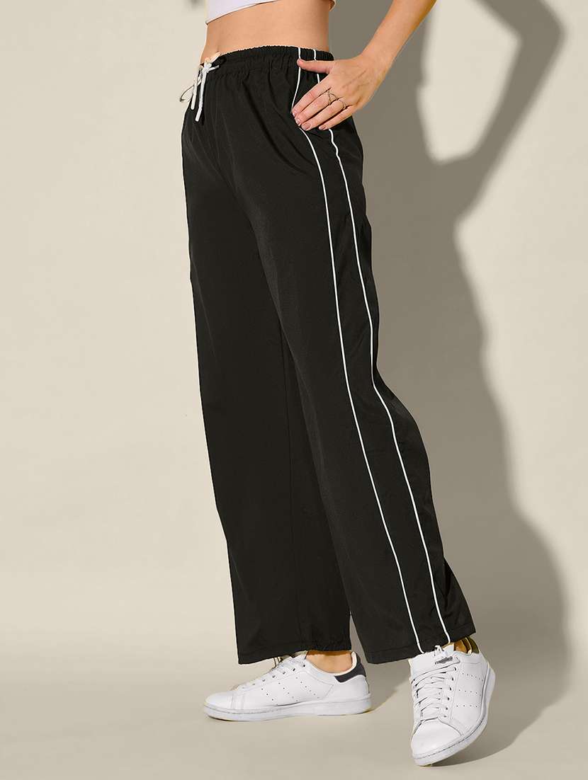 women solid high rise parachute pant