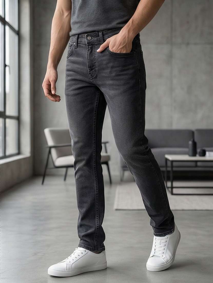 men washed high rise full length tapered jeans