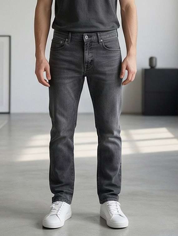 men washed high rise full length tapered jeans