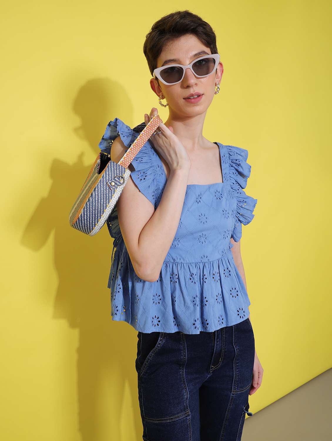 women blue solid sleevelelss schiffli peplum top