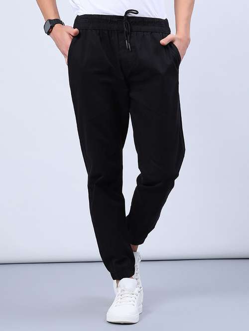 men solid mid rise relaxed fit jogger - 21932702 -  Standard Image - 0