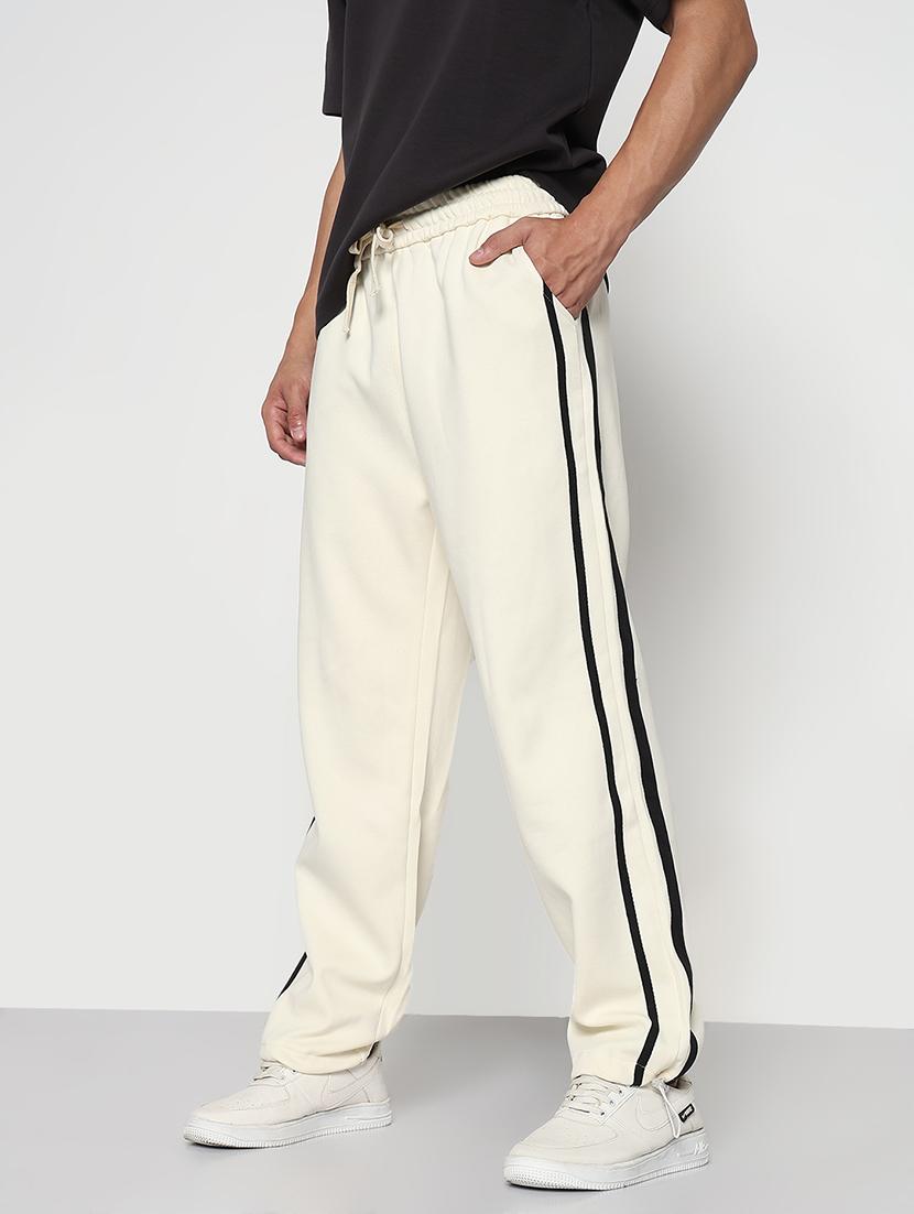 men cream side taped low rise full length track pant