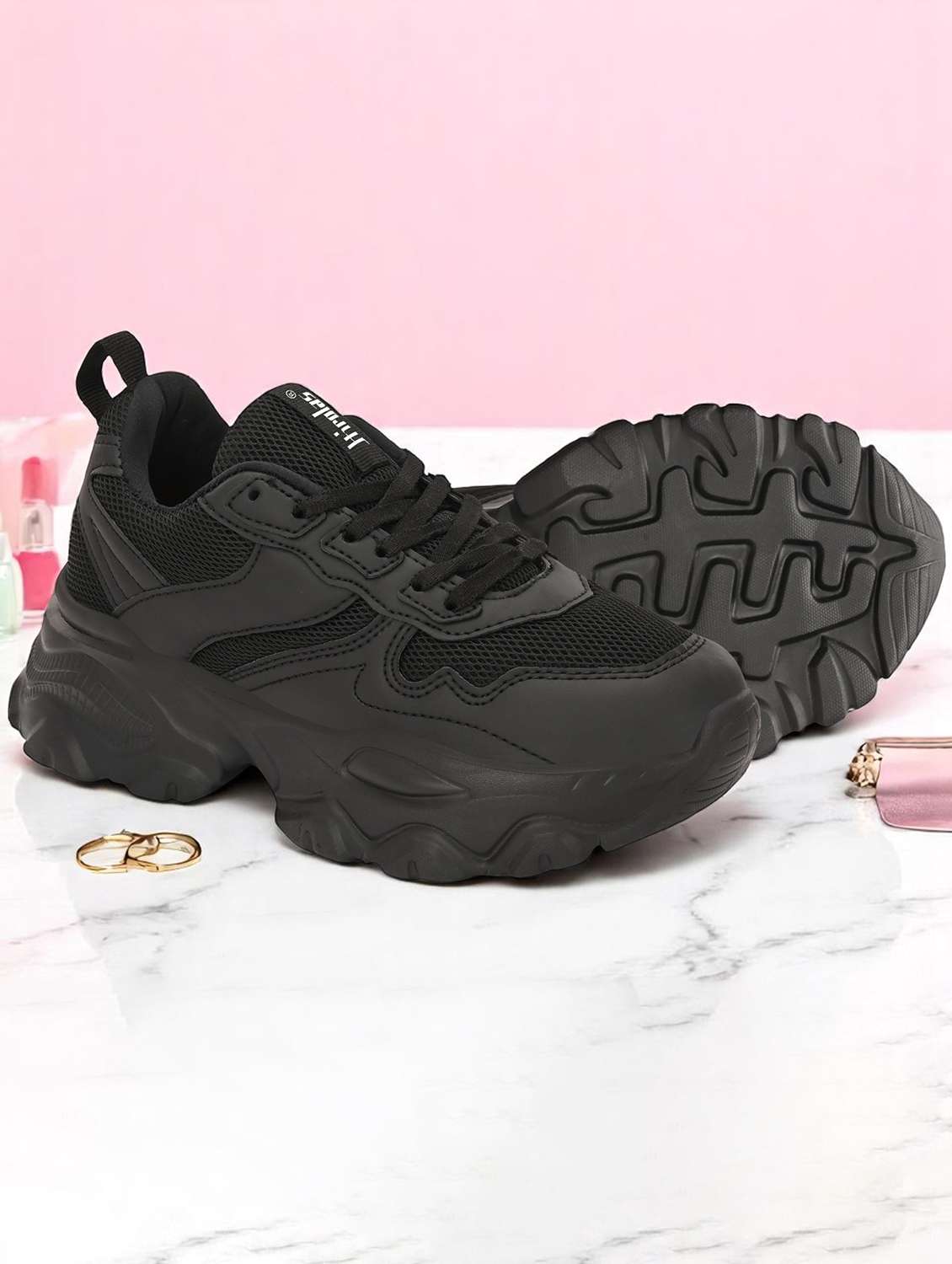 women black lace-up sports shoe