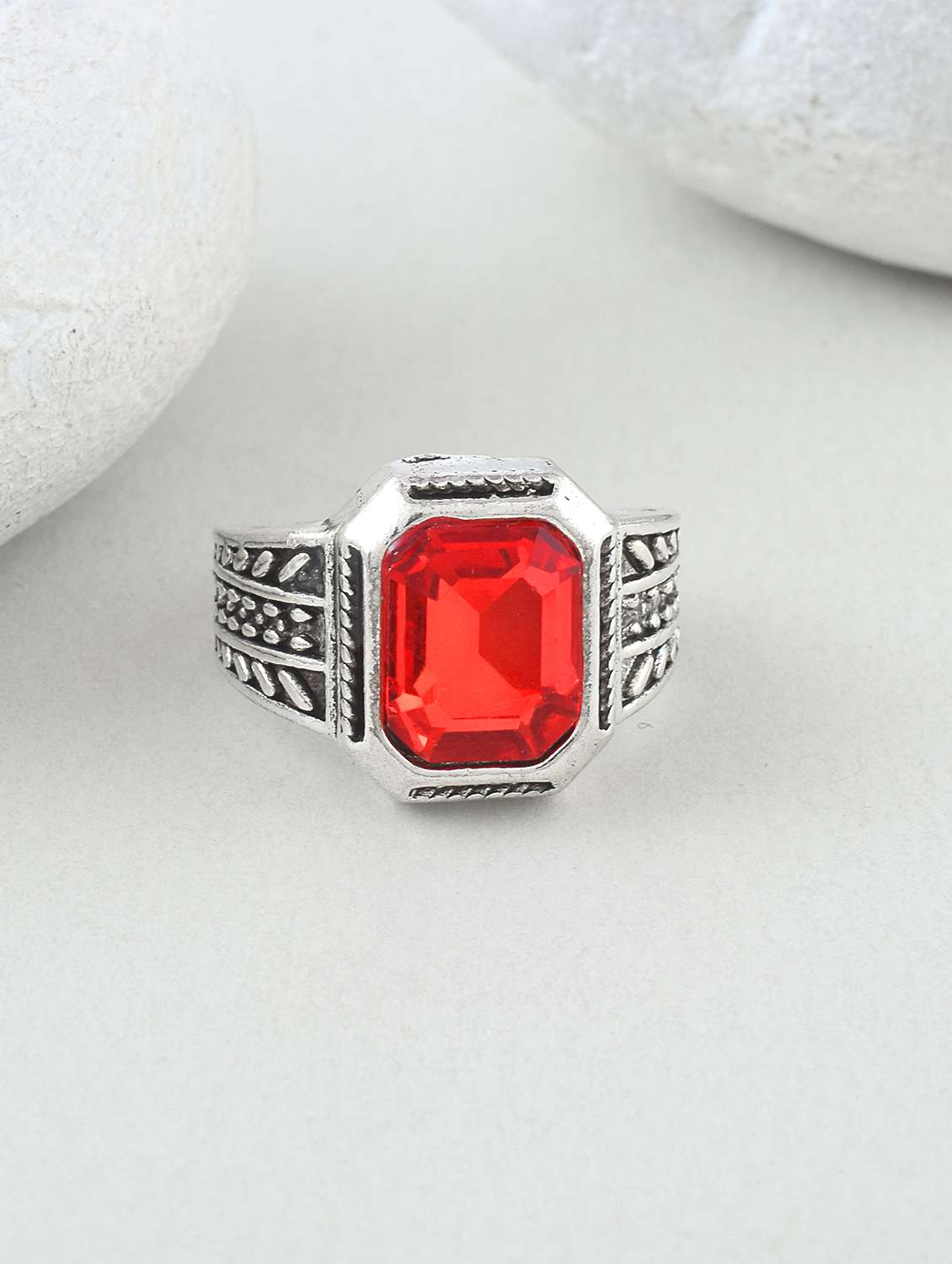 red stone studded silver toned statement ring