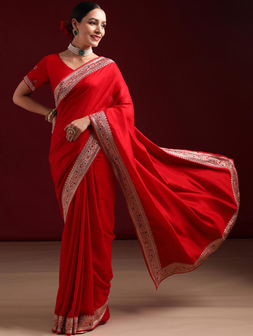 women solid with bordered saree with blouse