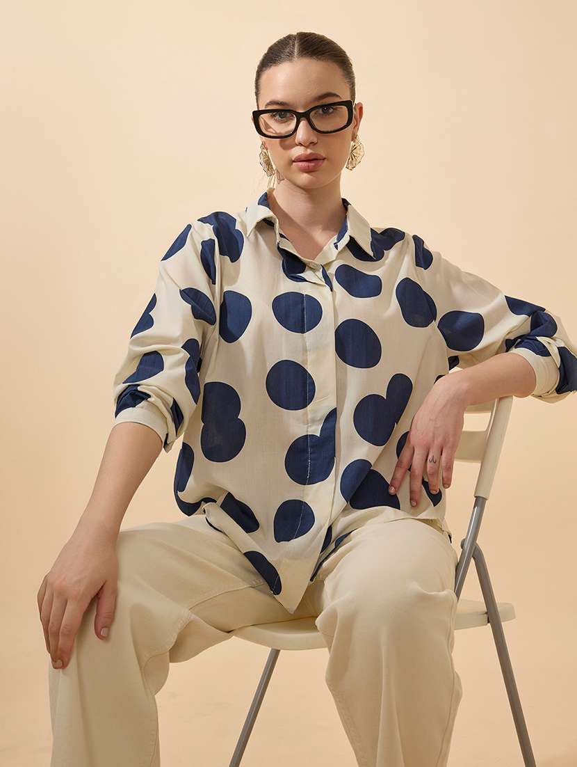 women polka doted collared long sleeve shirt