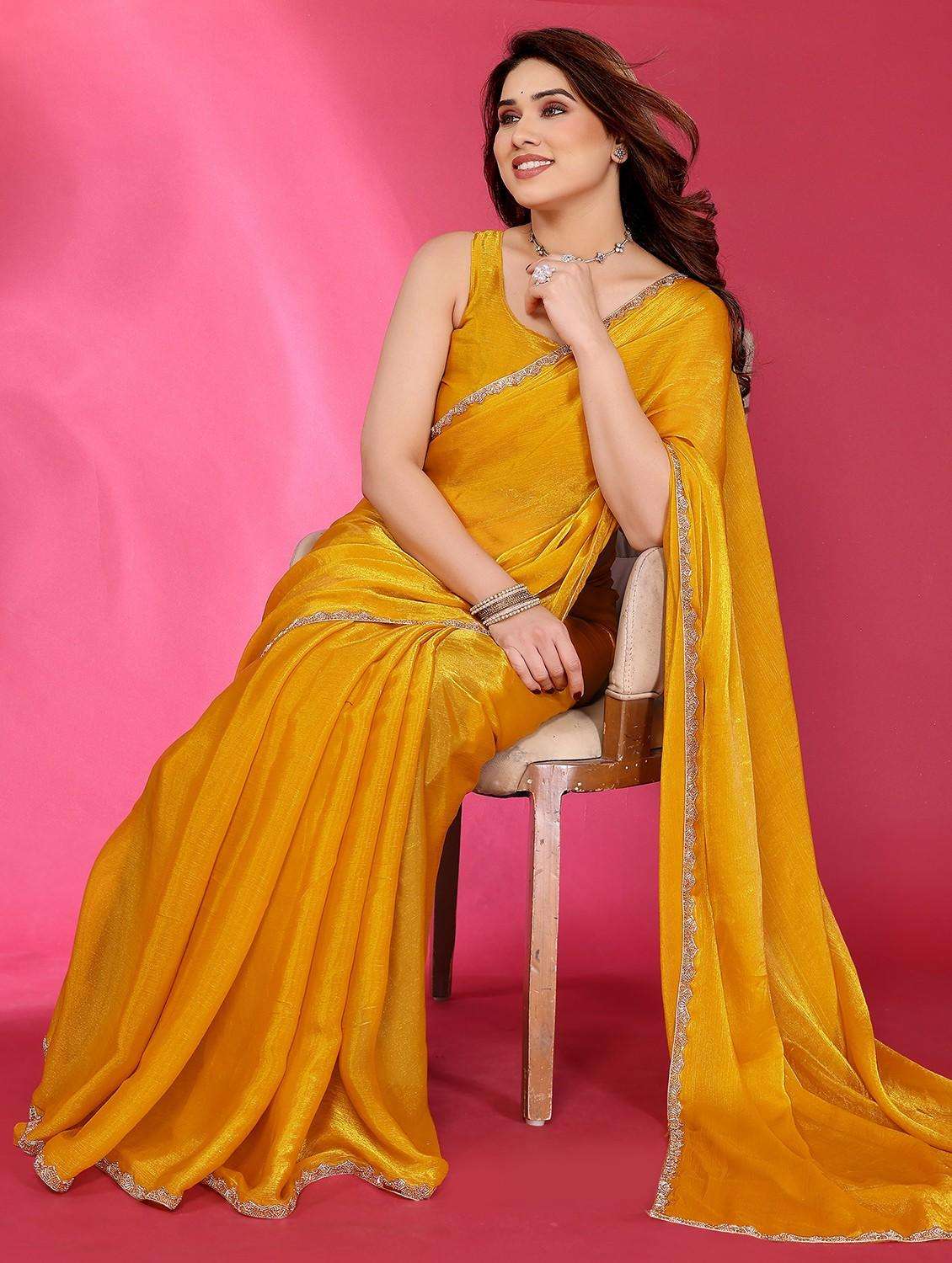 women solid embellished bordered saree with blouse